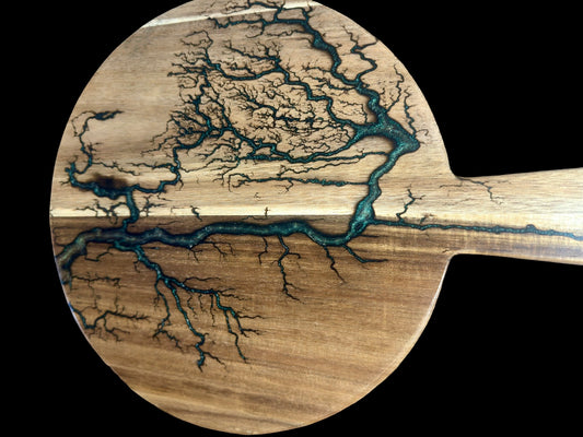 Handcrafted resin cheese board with fractal burning design by Fractal Flow Designs