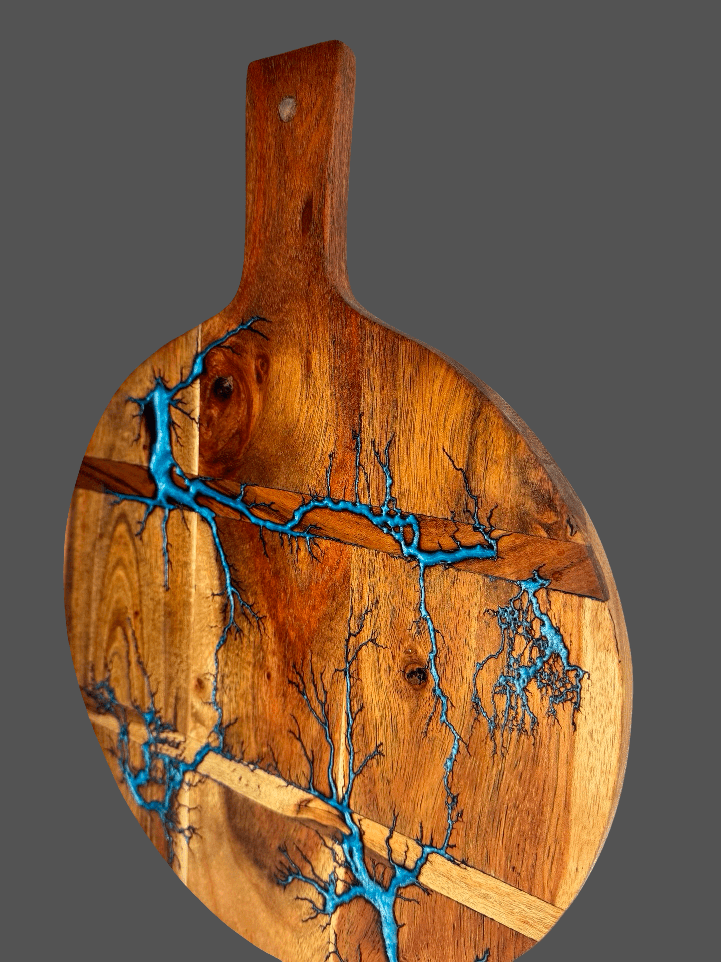 Round resin cheese paddle board by Fractal Flow Designs – luxury artisan serving board from Victoria, Australia, perfect for grazing platters, anniversaries, weddings, birthdays, and gourmet entertaining.