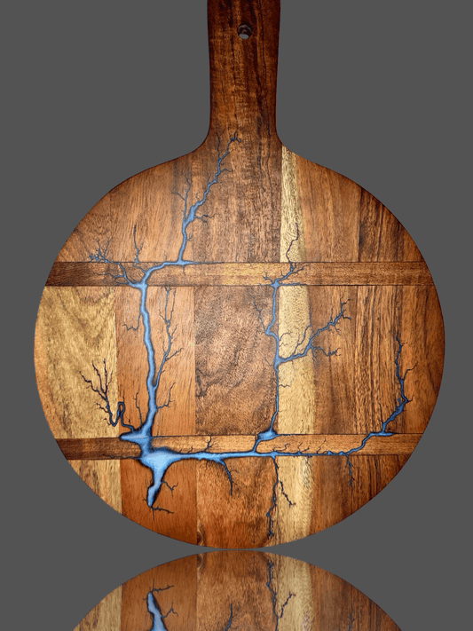 Round resin cheese paddle board handmade in Bairnsdale Victoria by Fractal Flow Designs – premium Australian timber platter for cheese, charcuterie, grazing, weddings, and gifting.
