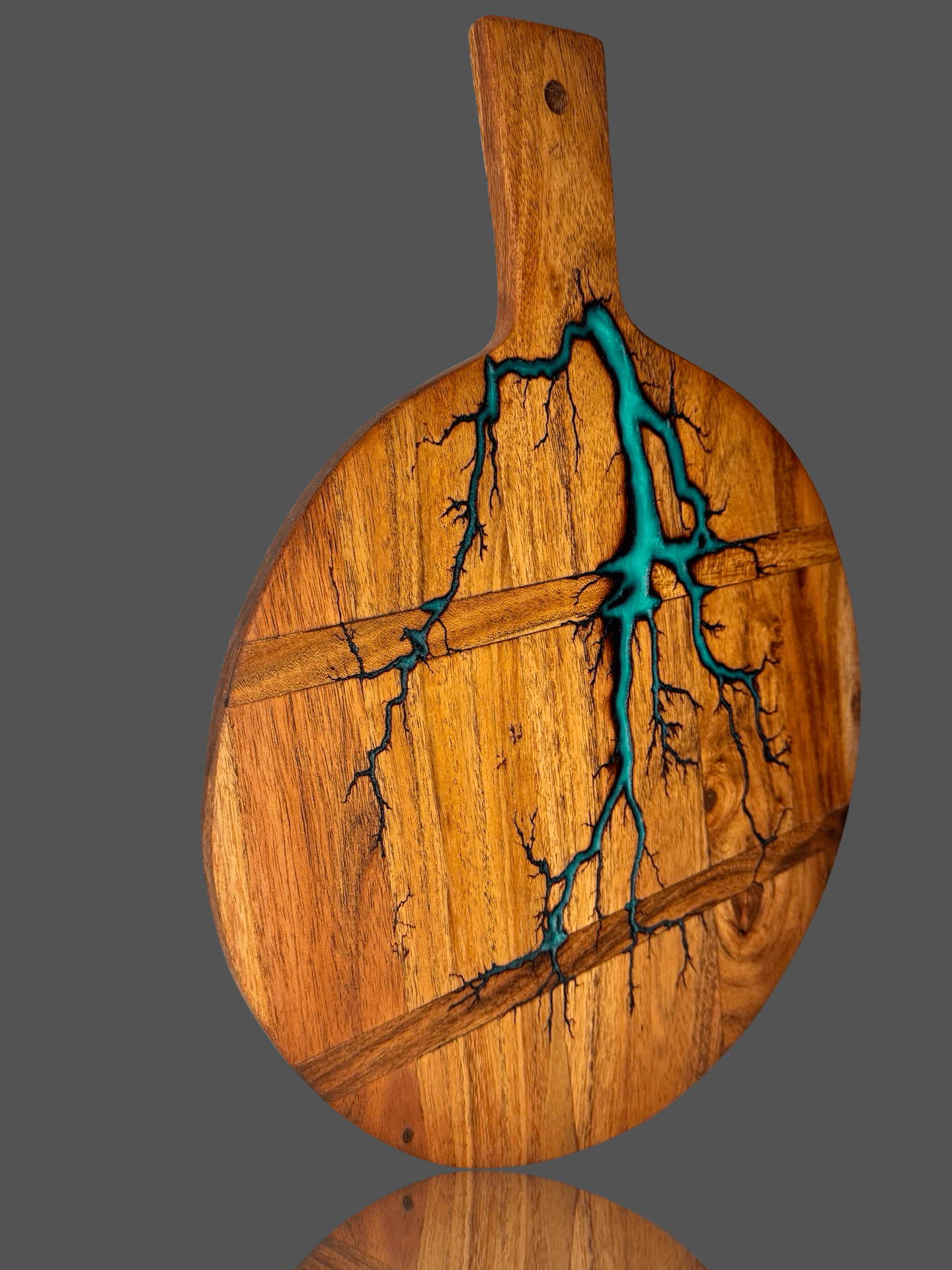 Round resin cheese paddle board styled with gourmet grazing platter – artisan serving piece made in Victoria, Australia, perfect for wedding tables, anniversaries, and entertaining at home