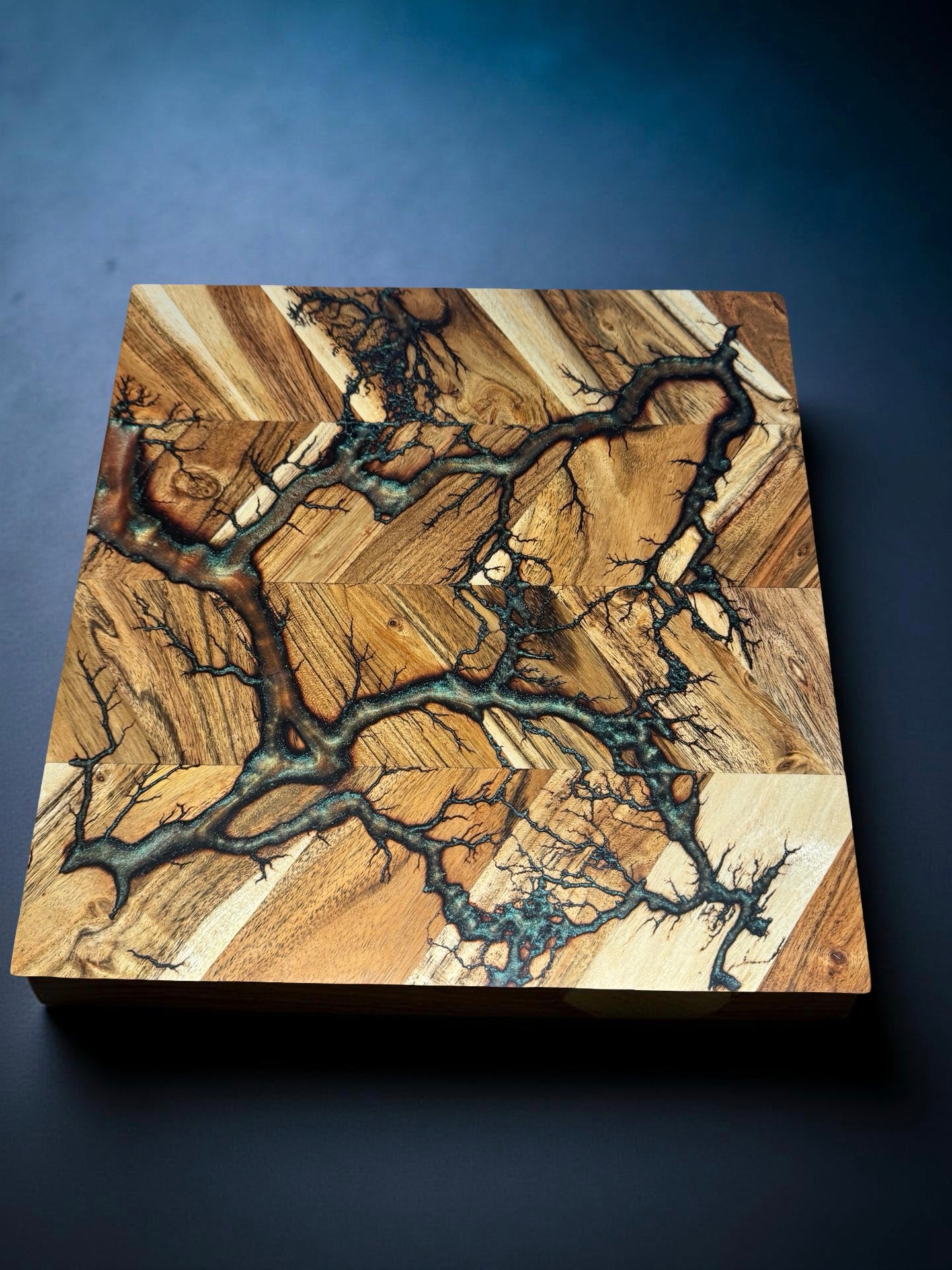 Square chopping board 320 x 320 featuring red green chameleon resin effects and high voltage fractal burning details sustainable Australian timber handmade by Fractal Flow Designs Australia’s resin board brand in East Gippsland