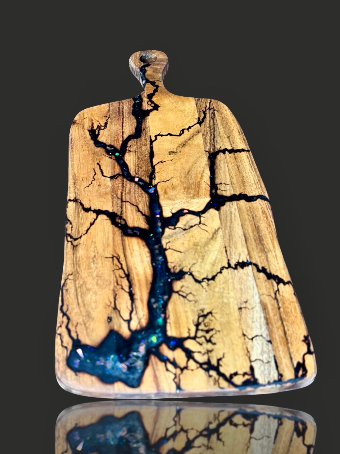 Rectangle Resin cheese paddle with bold fractal burn designs and resin inlay . Handmade in Victoria by Fractal Flow Designs, shipped nationwide for gift occasions.