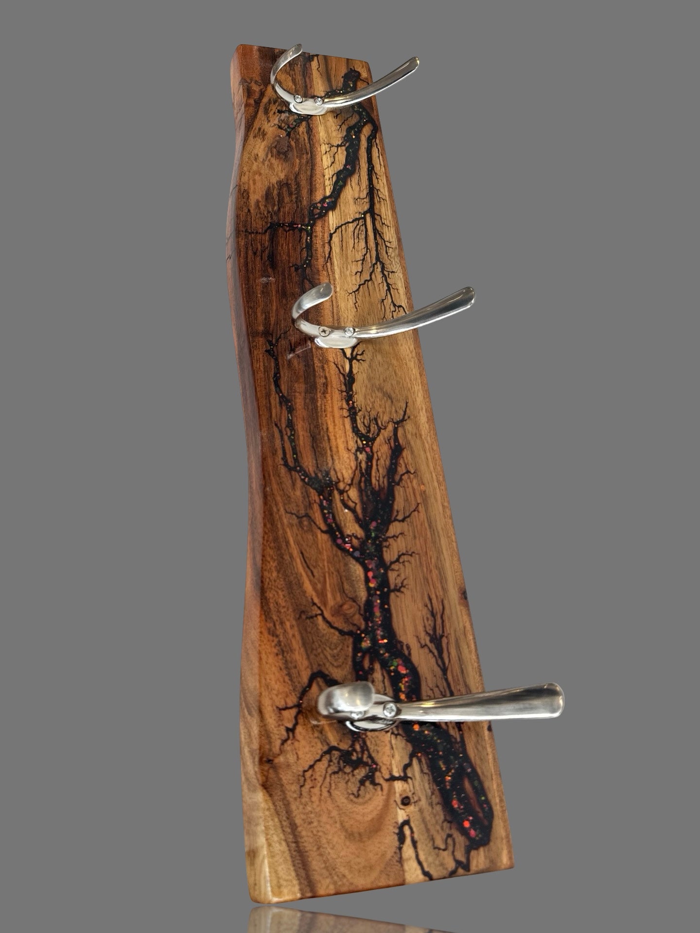 Australian timber coat rack handcrafted by Fractal Flow Designs in Bairnsdale, Victoria. Functional wall-mounted storage with striking fractal burn artwork.