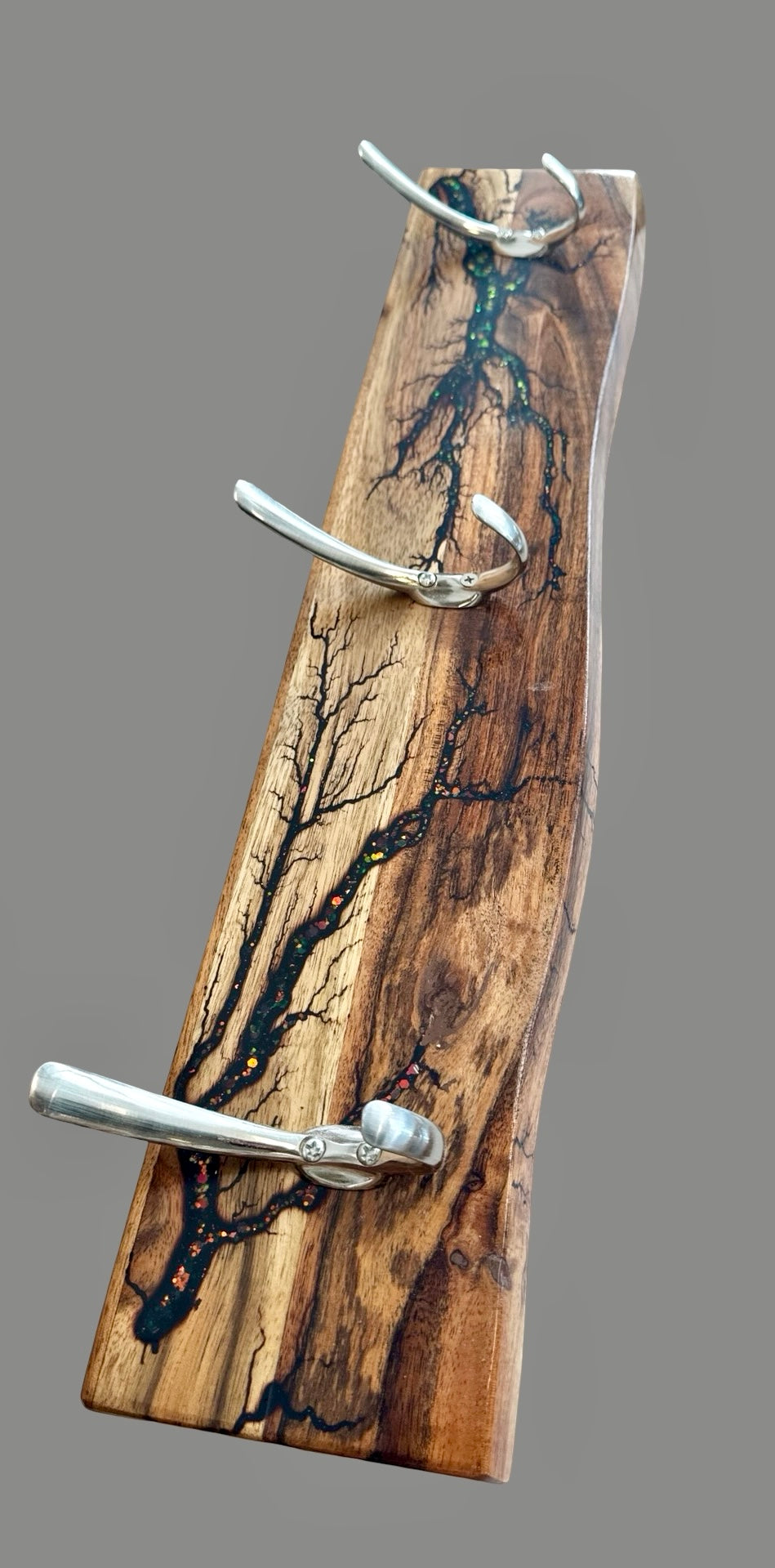 Fractal Flow Designs handcrafted coat rack, made in Australia from natural timber. Unique fractal patterns create a bold artisan home décor statement.