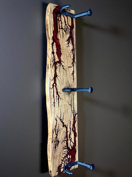 Red resin coat rack with sleek metal hooks, premium Australian home styling