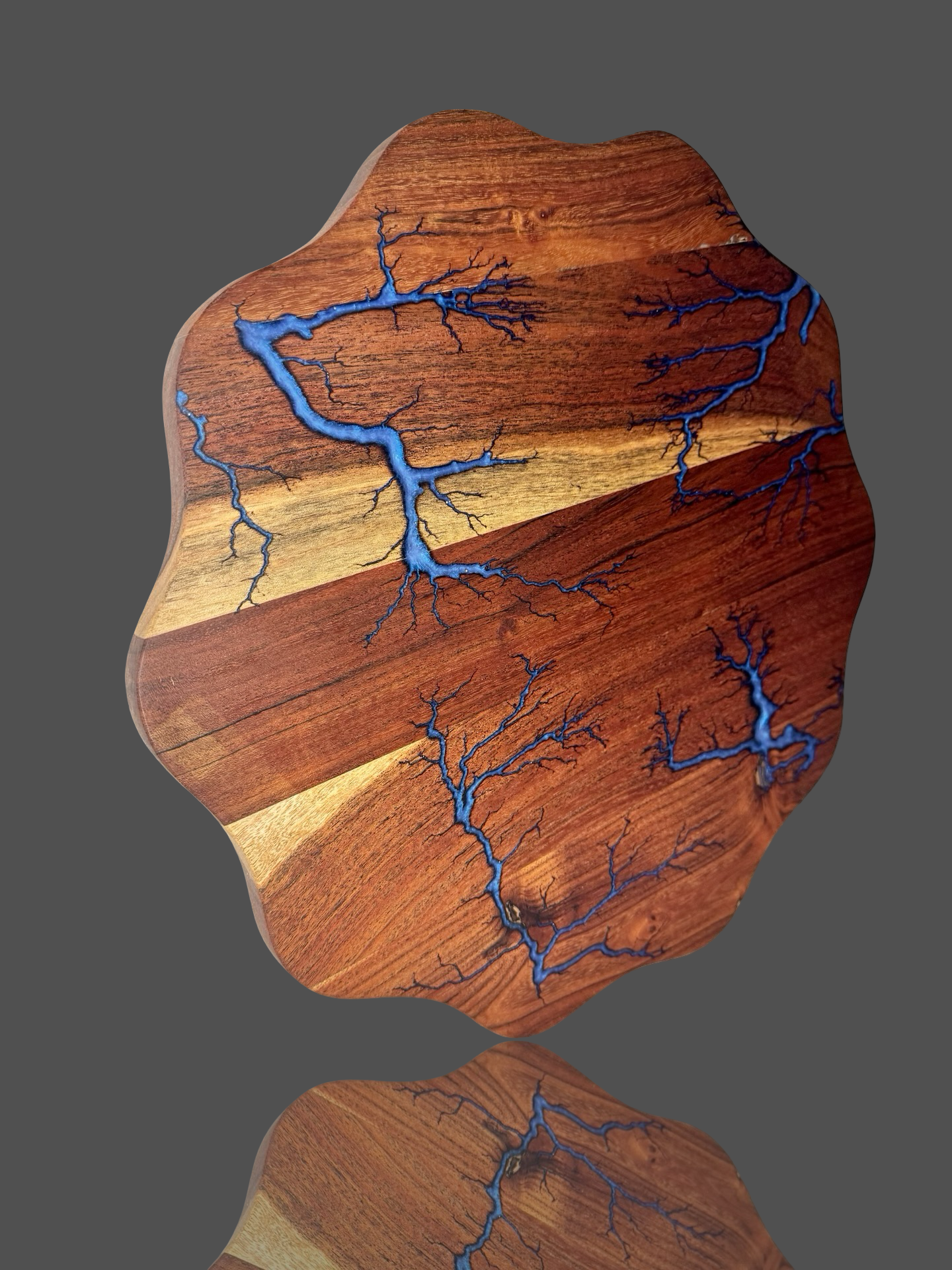 Handcrafted resin wave serving board by Fractal Flow Designs, Bairnsdale Victoria. Premium Australian hardwood with bold resin ocean wave art, perfect as a grazing platter, cheese board, or charcuterie gift. Unique fractal burning design, Australian-made, ships nationwide