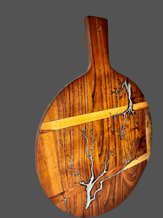 Luxury round resin cheese paddle board – premium Australian hardwood platter, handcrafted in Victoria for cheese, charcuterie, grazing, and weddings.